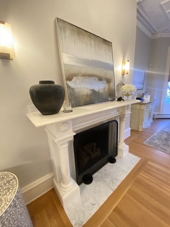 214 Commonwealth Avenue, Unit 1 Boston, MA 02116 - Photo 13 of 22 a bathroom with a sink and a mirror