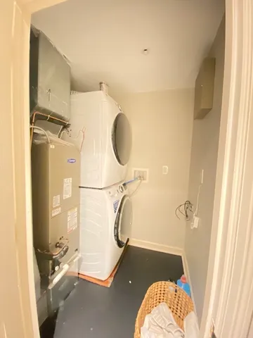 a bathroom with a sink and shower