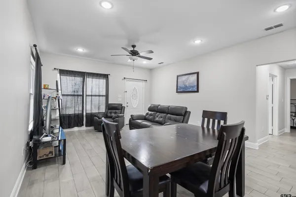 a view of a dining room with furniture