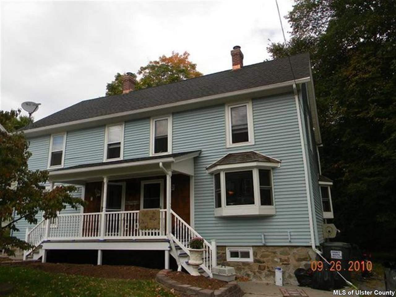 7 Cedar Street Rifton, NY 12471 - Photo 1 of 9 a front view of a house with a yard