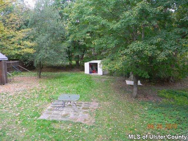 7 Cedar Street Rifton, NY 12471 - Photo 9 of 9 a backyard of a house with table and chairs