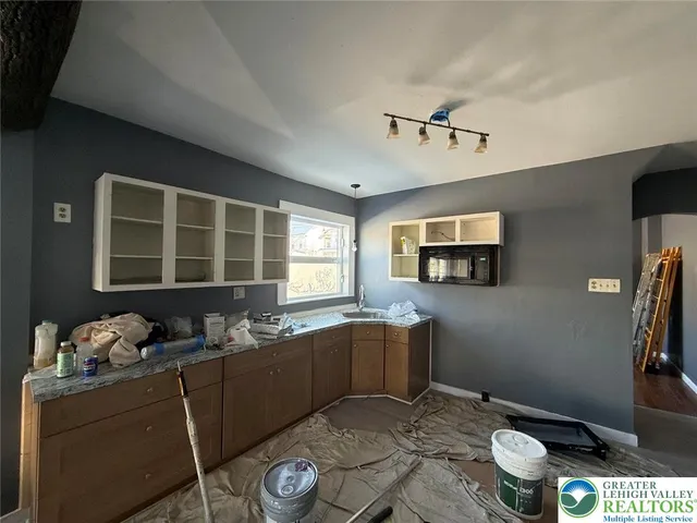 a living room with furniture and window