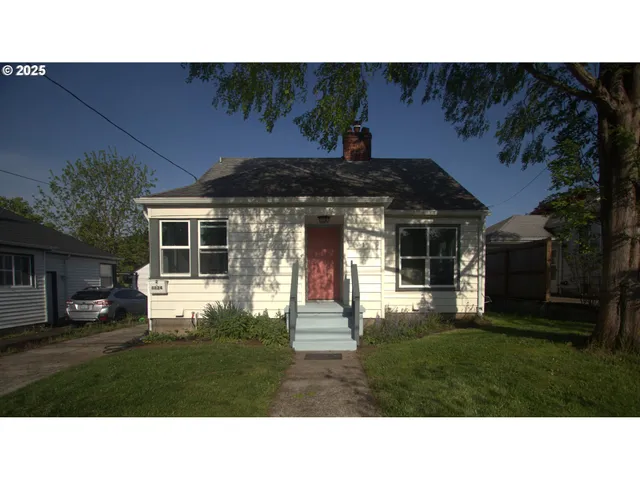 a black and white photo of a house
