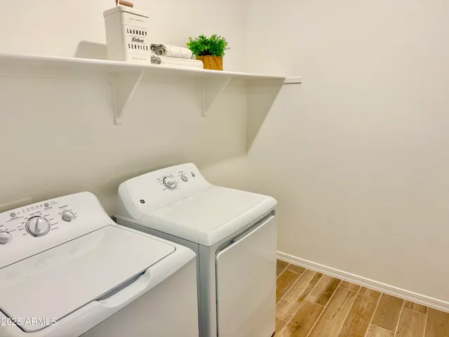 a utility room with dryer and washer