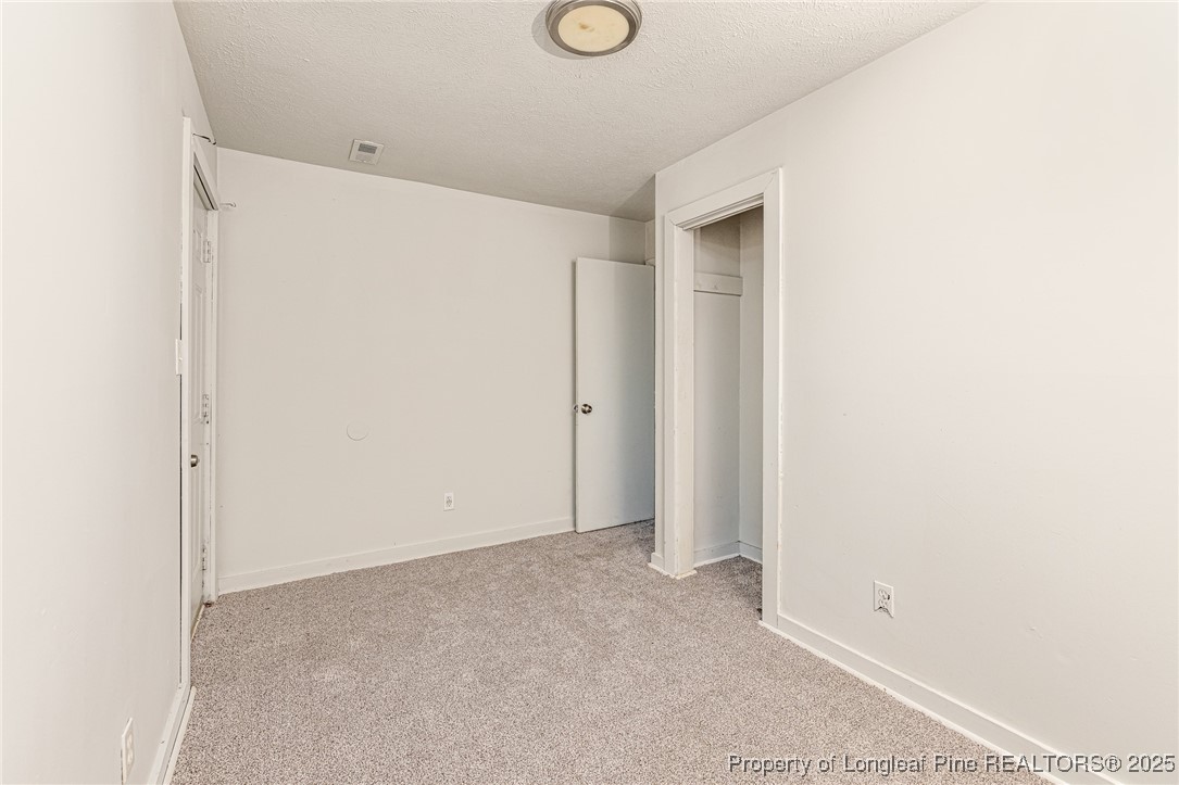 210 South Plymouth Street, Unit 1 Fayetteville, NC 28312 - Photo 13 of 26 a view of an empty room