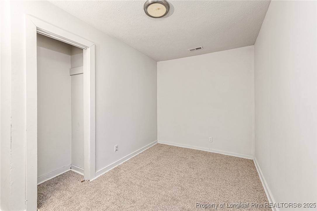 210 South Plymouth Street, Unit 1 Fayetteville, NC 28312 - Photo 22 of 26 a view of an empty room