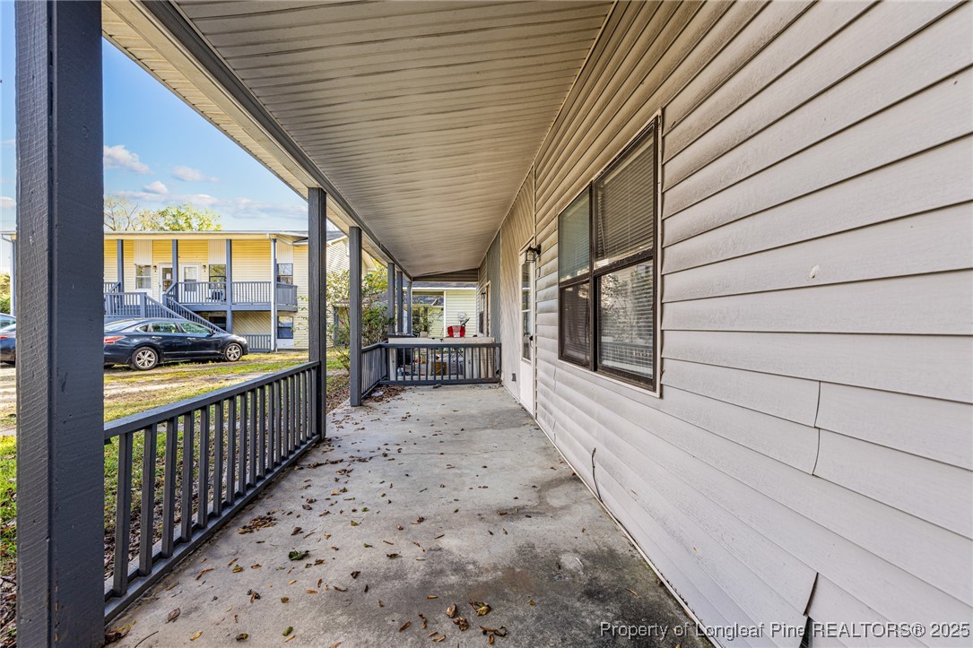 210 South Plymouth Street, Unit 1 Fayetteville, NC 28312 - Photo 5 of 26 a view of a porch