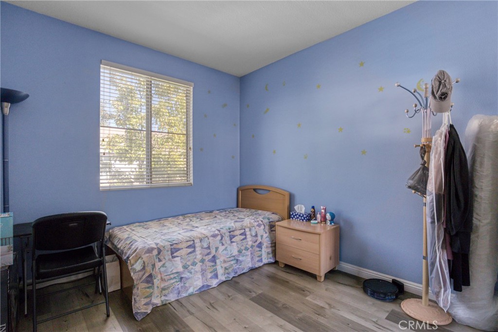 22754 Little Falls Court Saugus, CA 91350 - Photo 14 of 33 a bedroom with a bed and a window