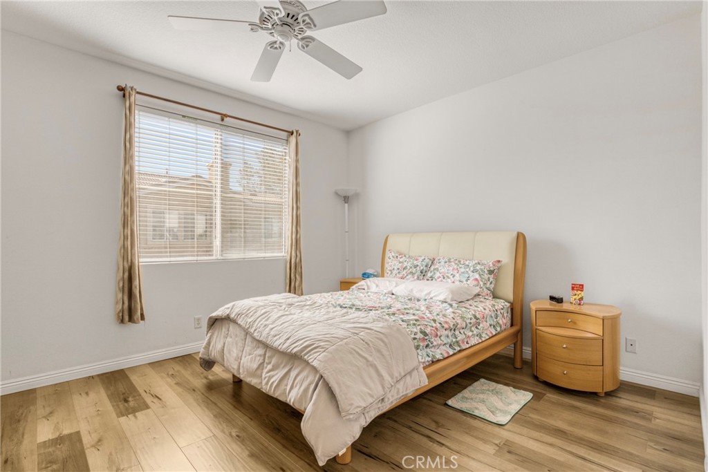 22754 Little Falls Court Saugus, CA 91350 - Photo 10 of 33 a bedroom with a bed and a window