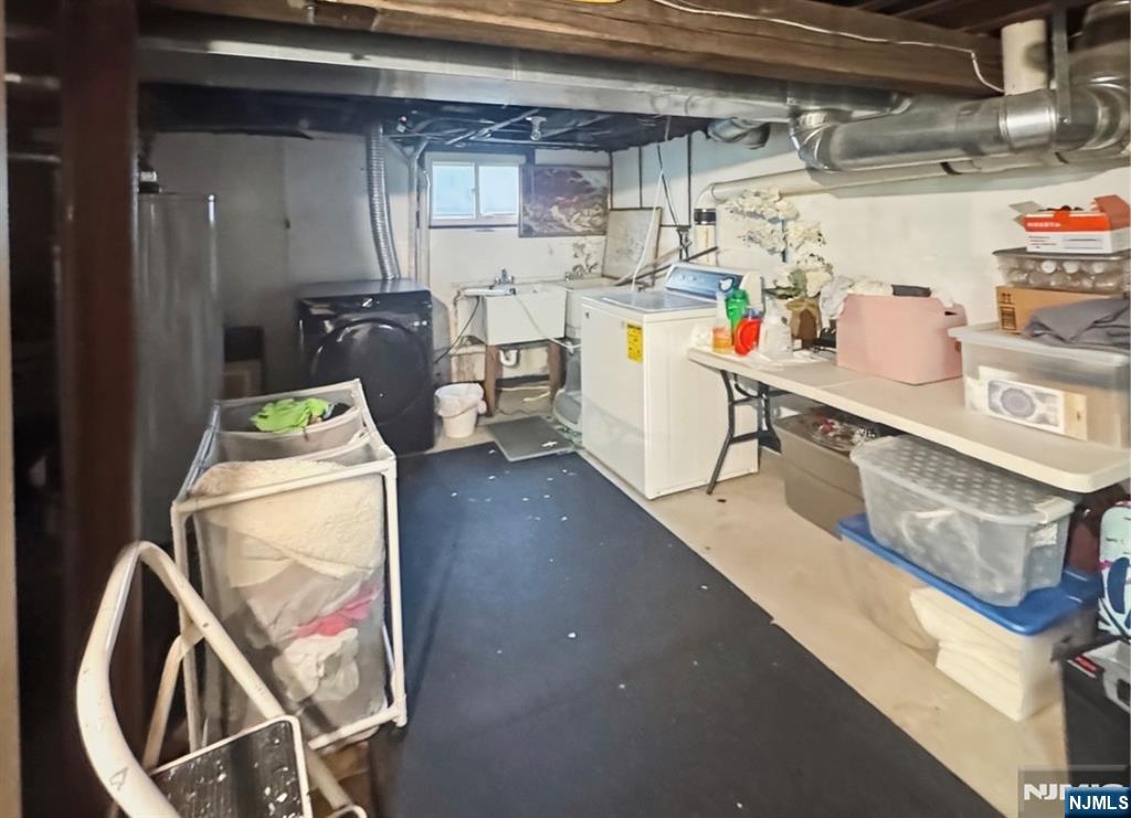 68 Washington Avenue Rutherford, NJ 07070 - Photo 20 of 23 a utility room with sink dryer and washer