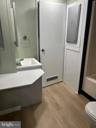 a view of a big room with wooden floor