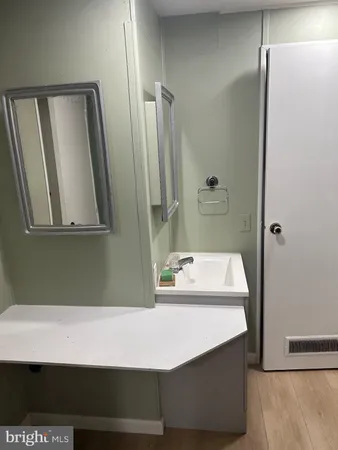 a view of a refrigerator in kitchen