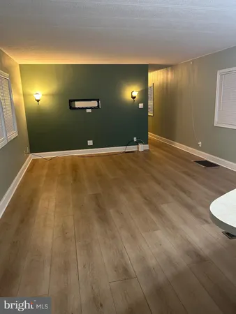 a view of a room with basketball court