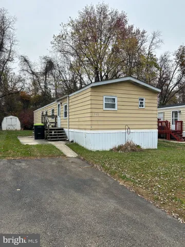 a house view with a backyard space