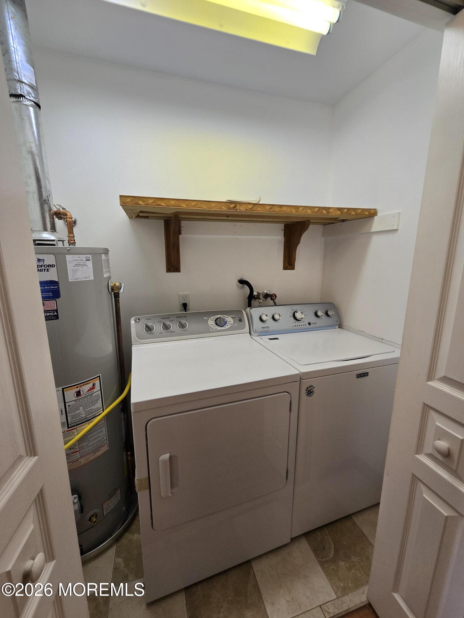 274 Easy Street, Unit RIGHT Howell, NJ 07731 - Photo 11 of 19 a utility room with dryer and washer
