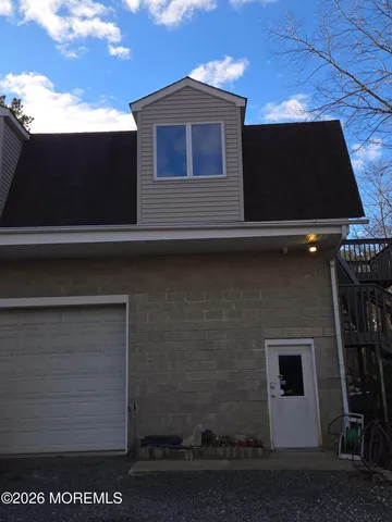 a front view of house with garage