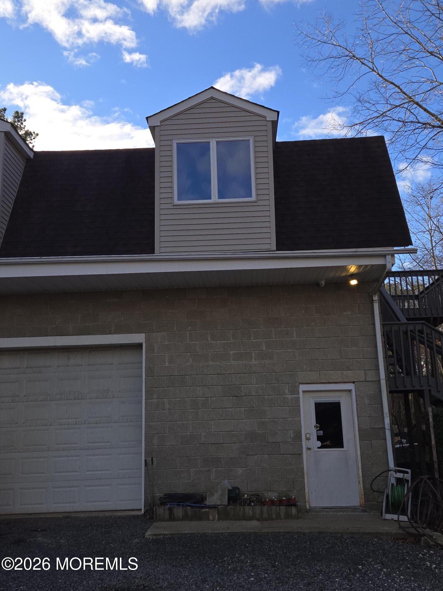 274 Easy Street, Unit RIGHT Howell, NJ 07731 - Photo 19 of 19 a front view of house with garage