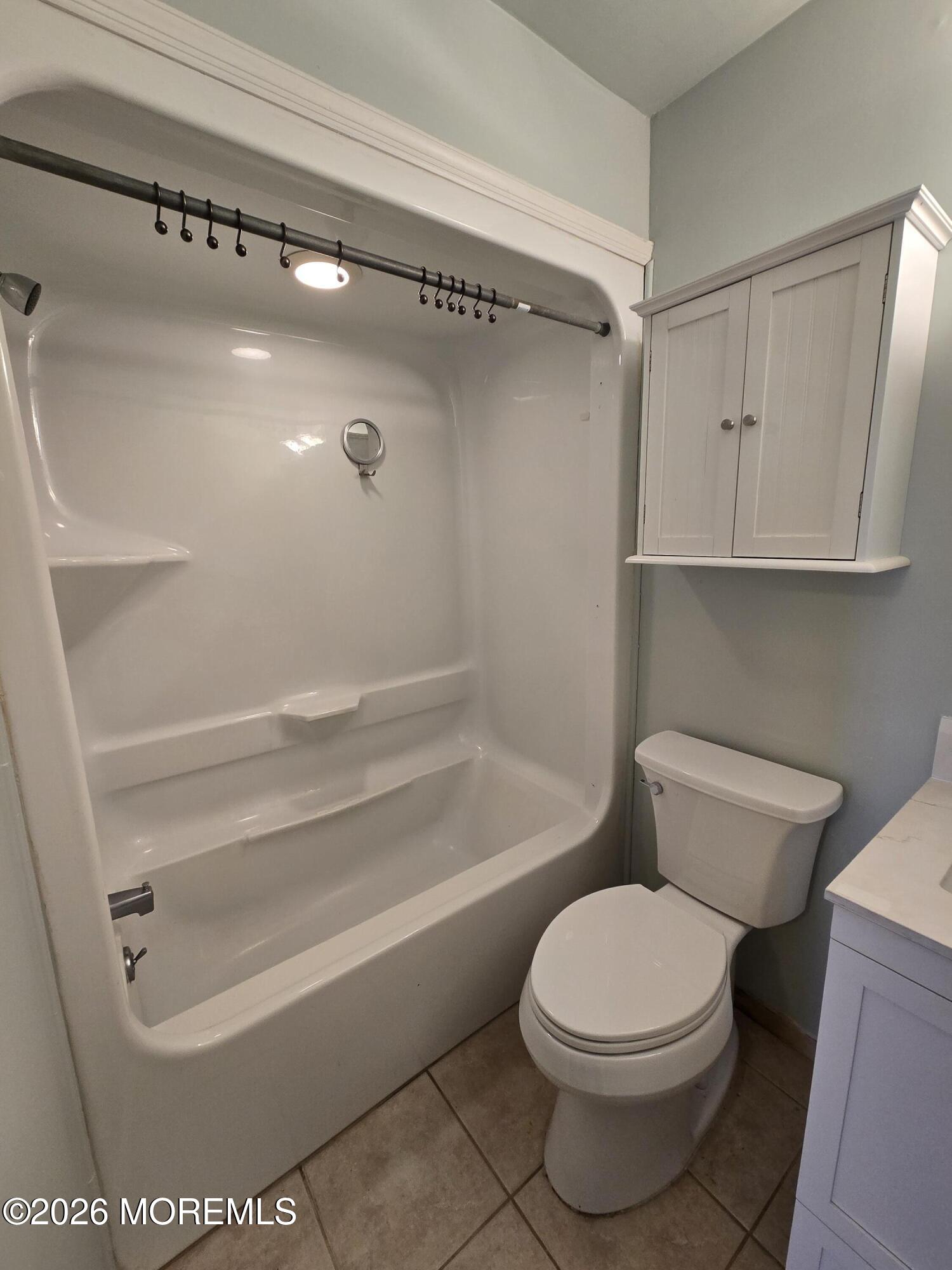 274 Easy Street, Unit RIGHT Howell, NJ 07731 - Photo 10 of 19 a bathroom with a toilet and a shower