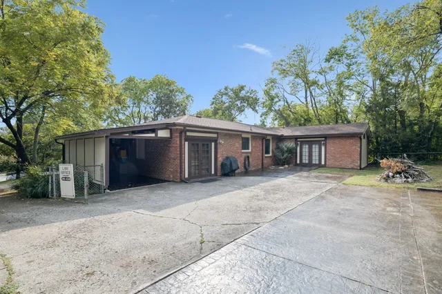a house view with a backyard space