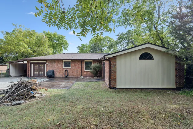 a house with trees in the background