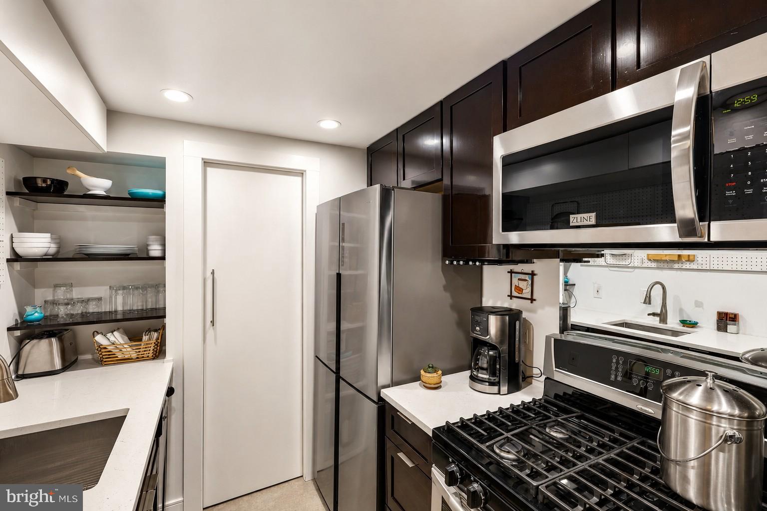 3701 Connecticut Avenue Northwest, Unit 416 Washington, DC 20008 - Photo 11 of 34 Sleek modern kitchen with stylish finishes.