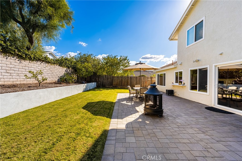 25671 Westover Circle Lake Forest, CA 92630 - Photo 17 of 37 a view of a swimming pool with a lounge chair