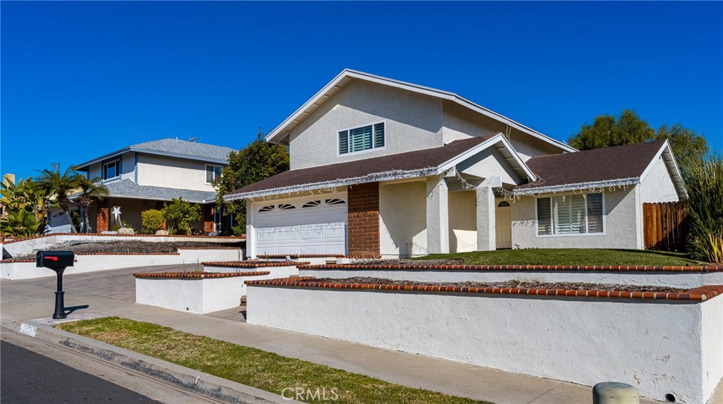 25671 Westover Circle Lake Forest, CA 92630 - Photo 2 of 37 a front view of a house with entertaining space