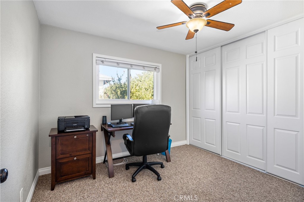 25671 Westover Circle Lake Forest, CA 92630 - Photo 29 of 37 a view of a workspace with furniture and a window