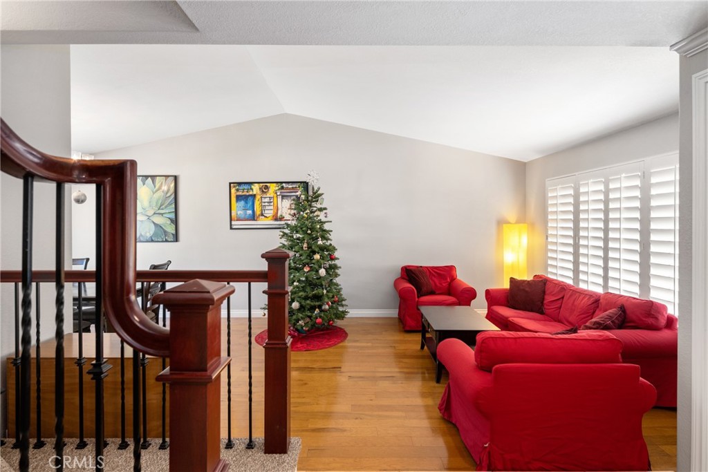 25671 Westover Circle Lake Forest, CA 92630 - Photo 6 of 37 a living room with furniture and a potted plant