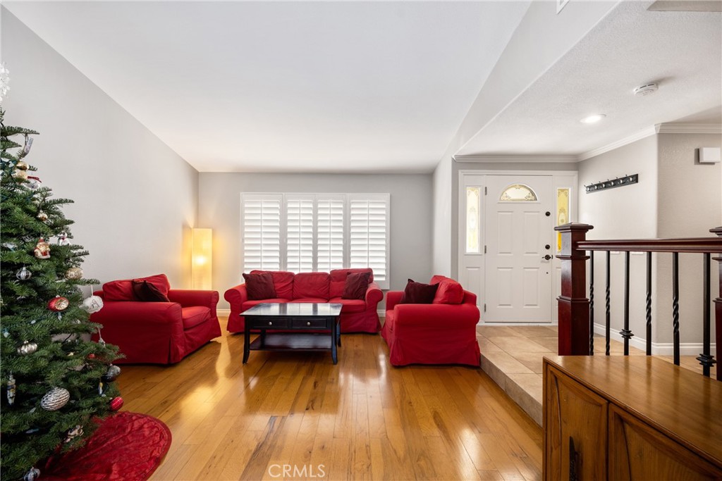 25671 Westover Circle Lake Forest, CA 92630 - Photo 37 of 37 a living room with furniture window and wooden floor
