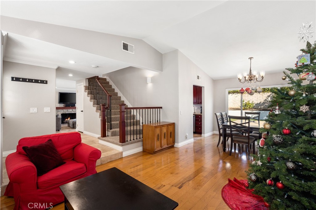 25671 Westover Circle Lake Forest, CA 92630 - Photo 8 of 37 a living room with furniture kitchen view and a potted plant