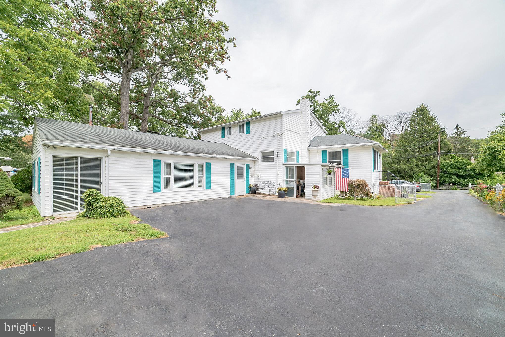 612 Carvel Grove Road Baltimore, MD 21221 - Photo 13 of 21 front view of a house with a street