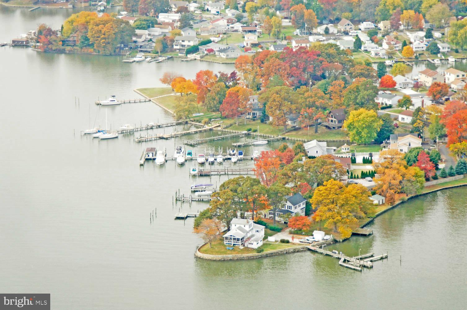 612 Carvel Grove Road Baltimore, MD 21221 - Photo 16 of 21 a view of water body with boats and trees
