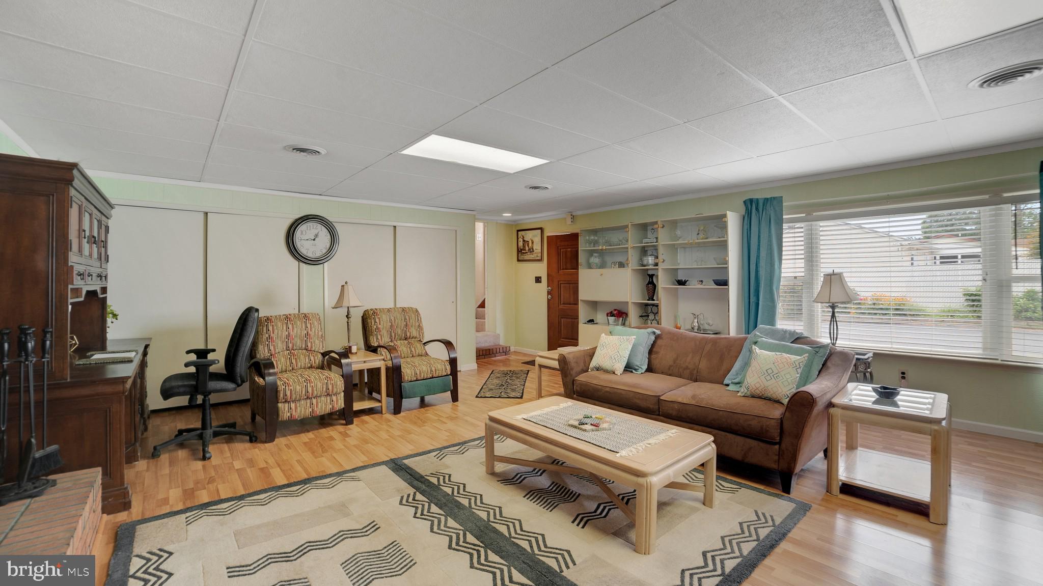 612 Carvel Grove Road Baltimore, MD 21221 - Photo 5 of 21 a living room with furniture and a large window