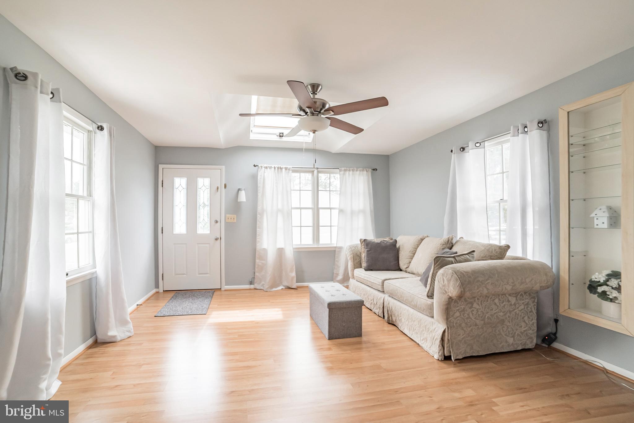 612 Carvel Grove Road Baltimore, MD 21221 - Photo 6 of 21 a living room with furniture and a large window