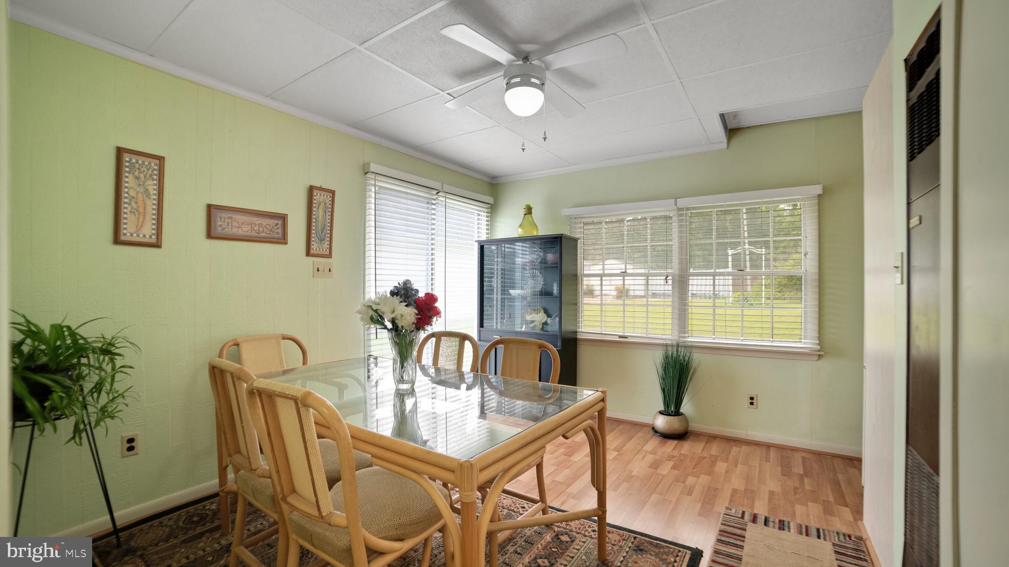 612 Carvel Grove Road Baltimore, MD 21221 - Photo 7 of 21 a view of a dining room with furniture window and outside view