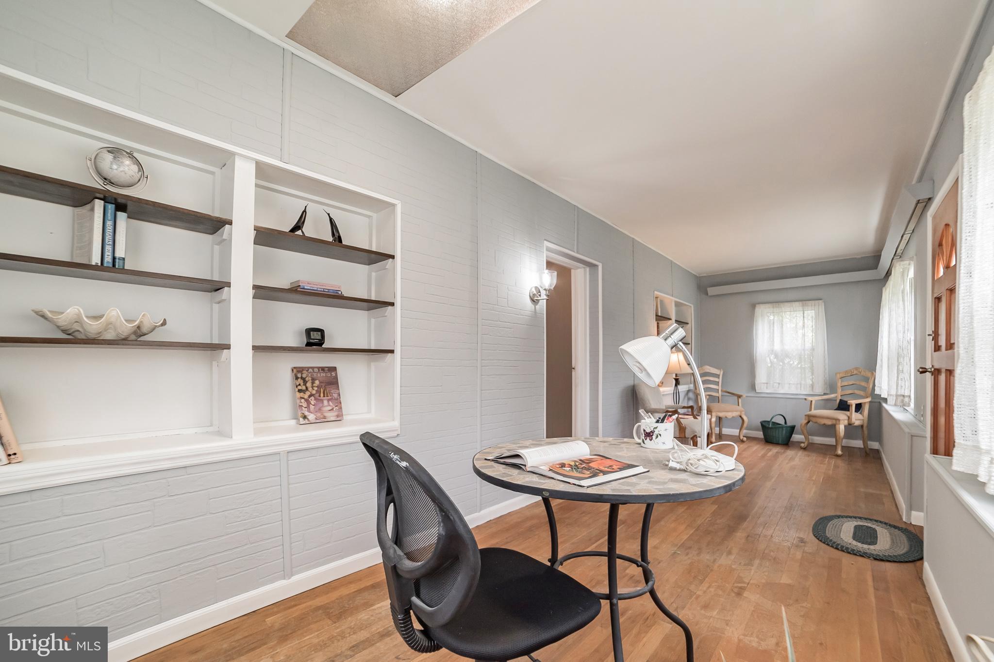 612 Carvel Grove Road Baltimore, MD 21221 - Photo 8 of 21 a view of a dining room with furniture and wooden floor