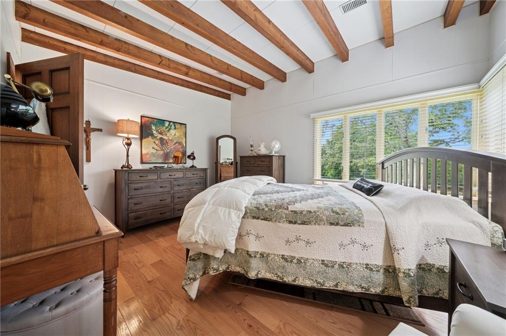 353 Linnwood Road Eighty Four, PA 15330 - Photo 18 of 36 a bedroom with a bed a window and dresser