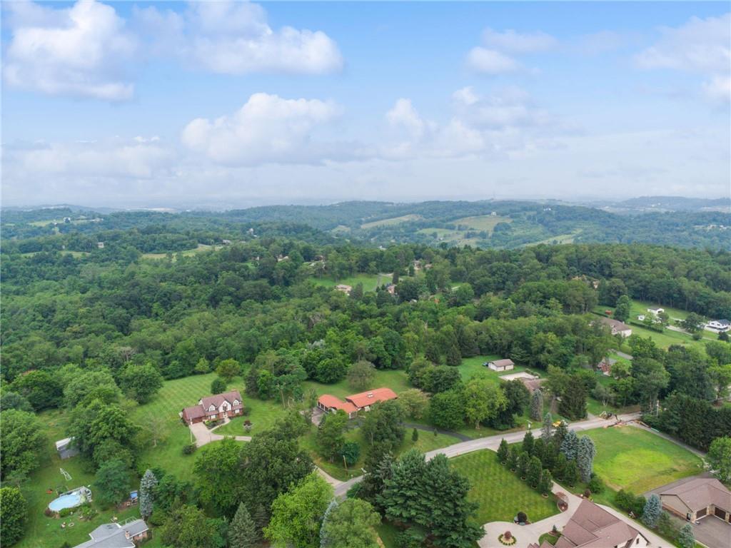 353 Linnwood Road Eighty Four, PA 15330 - Photo 3 of 36 a view of a city with lush green forest