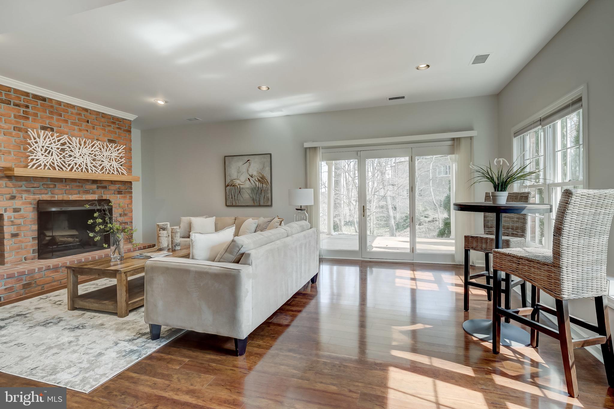 380 South River Landing Road Edgewater, MD 21037 - Photo 42 of 70 Family Room with brick wood-burning fireplace