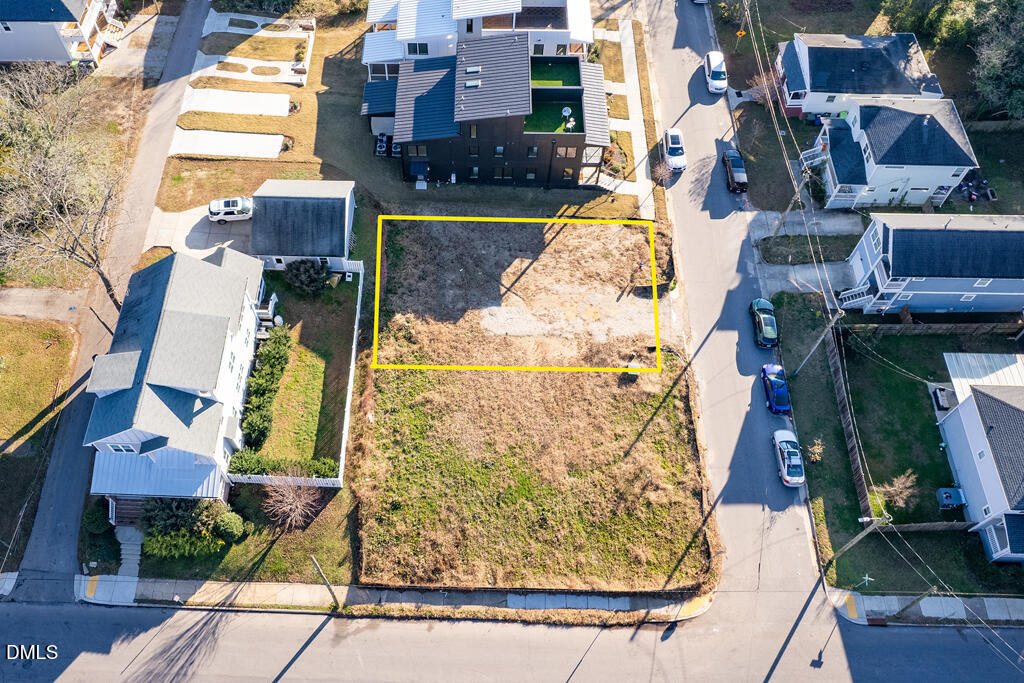405 Alston Street Raleigh, NC 27601 - Photo 3 of 12 an aerial view of residential houses with outdoor space
