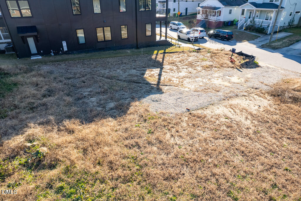 405 Alston Street Raleigh, NC 27601 - Photo 10 of 12 a view of a yard with a house