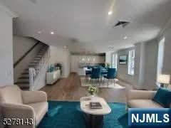 a living room with furniture and a table