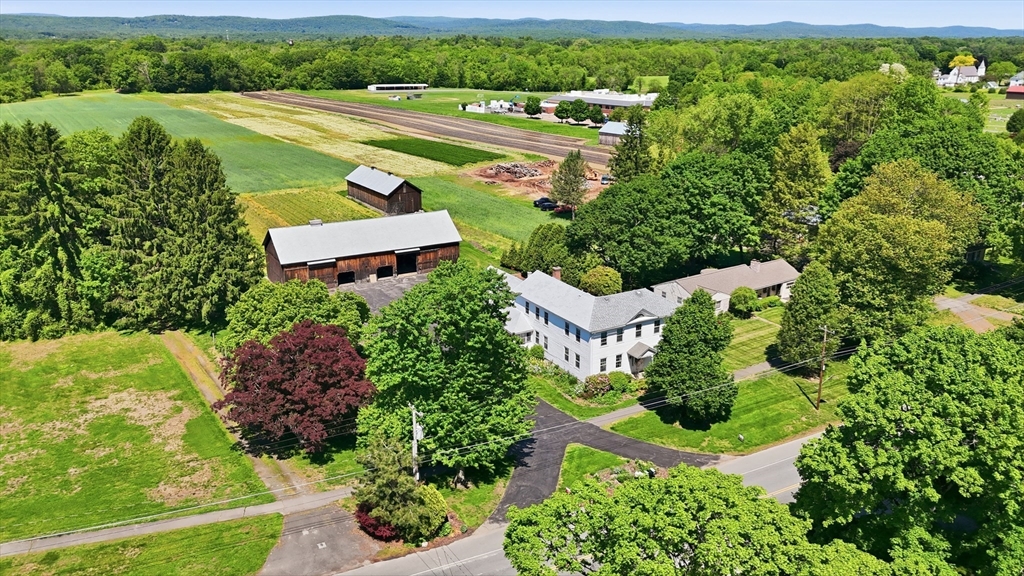 15 Main Street Hatfield, MA 01038 - Photo 38 of 42 an aerial view of a house with garden space and street view