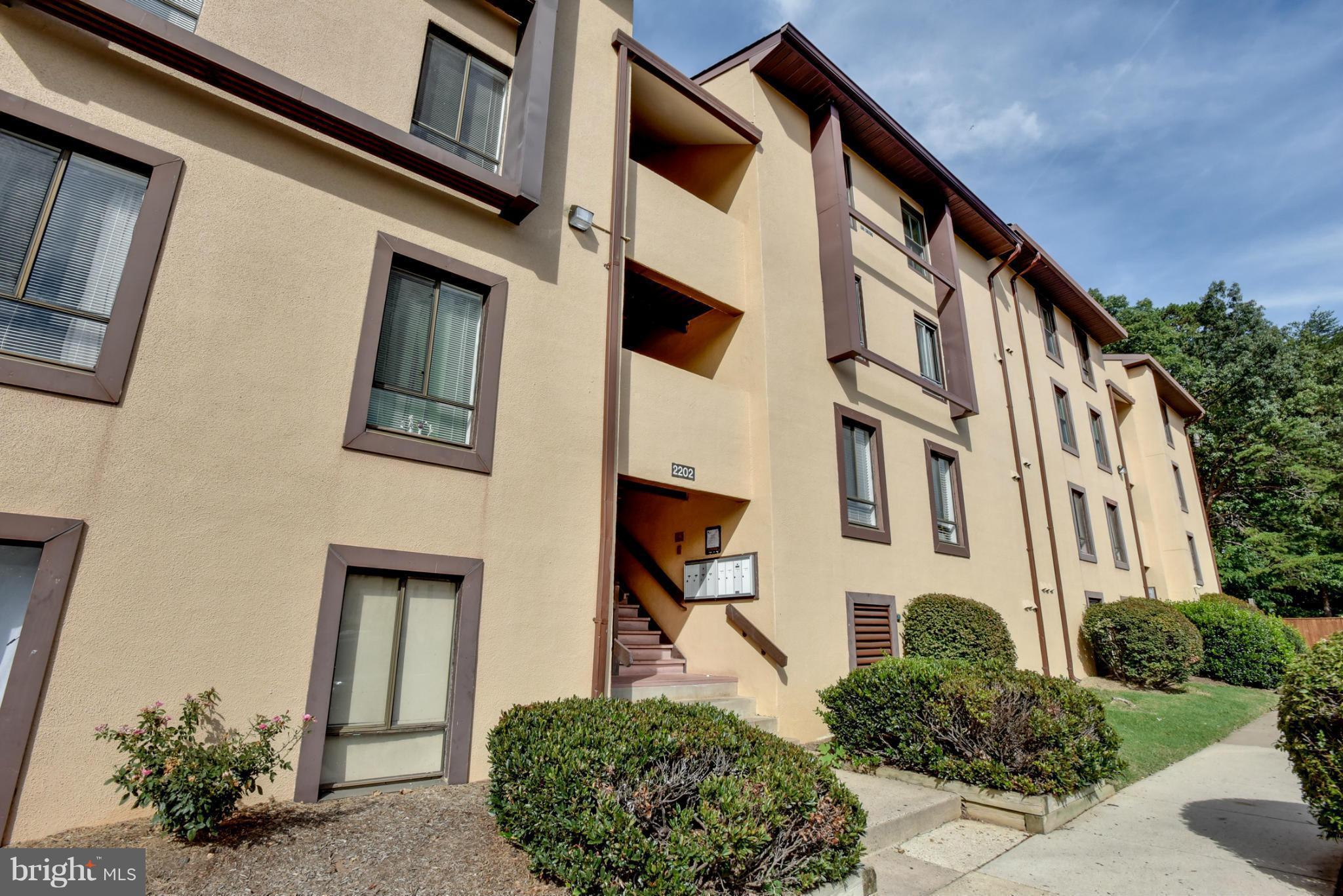 2202 Castle Rock Square, Unit 21C Reston, VA 20191 - Photo 1 of 23 Front of Building