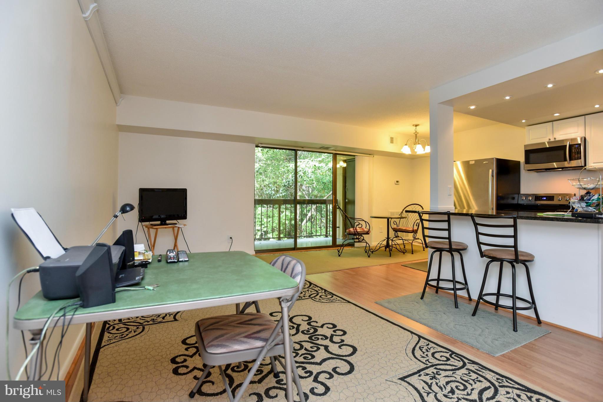 2202 Castle Rock Square, Unit 21C Reston, VA 20191 - Photo 4 of 23 View of Living/Dining/Kitchen