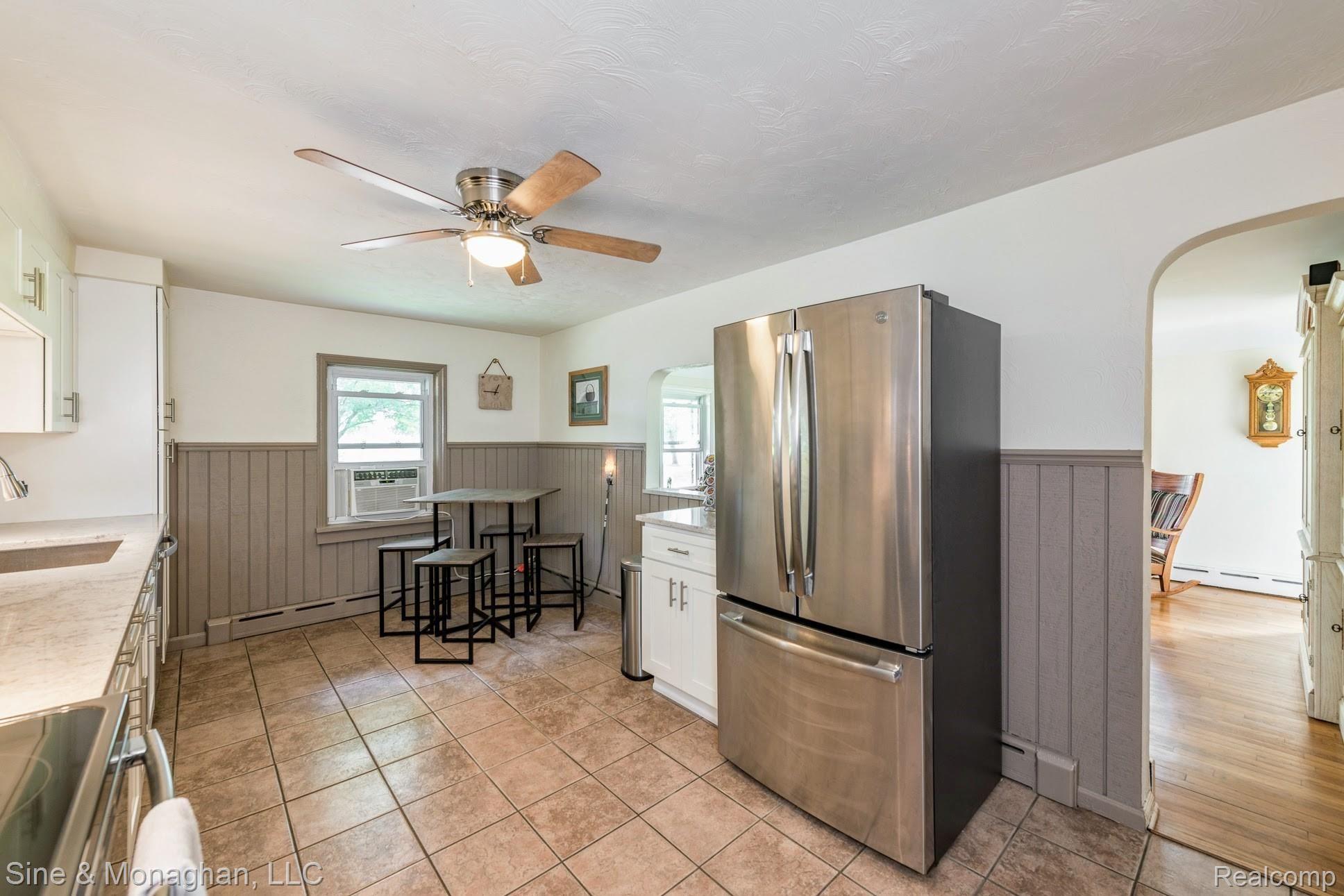 39716 Willow Road New Boston, MI 48164 - Photo 5 of 41 Stainless appliances in newly renovated kitchen