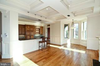 4 Logan Circle Northwest, Unit 2 Washington, DC 20005 - Photo 3 of 6 a view of a room with furniture and wooden floor
