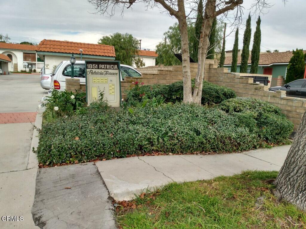 1851 Patricia Avenue, Unit 102 Simi Valley, CA 93065 - Photo 17 of 23 a backyard of a house with lots of green space