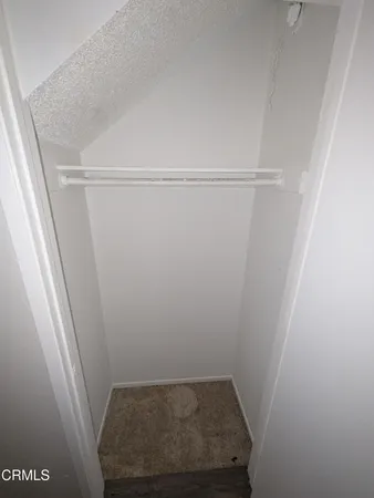 a view of small space with racks on the wall